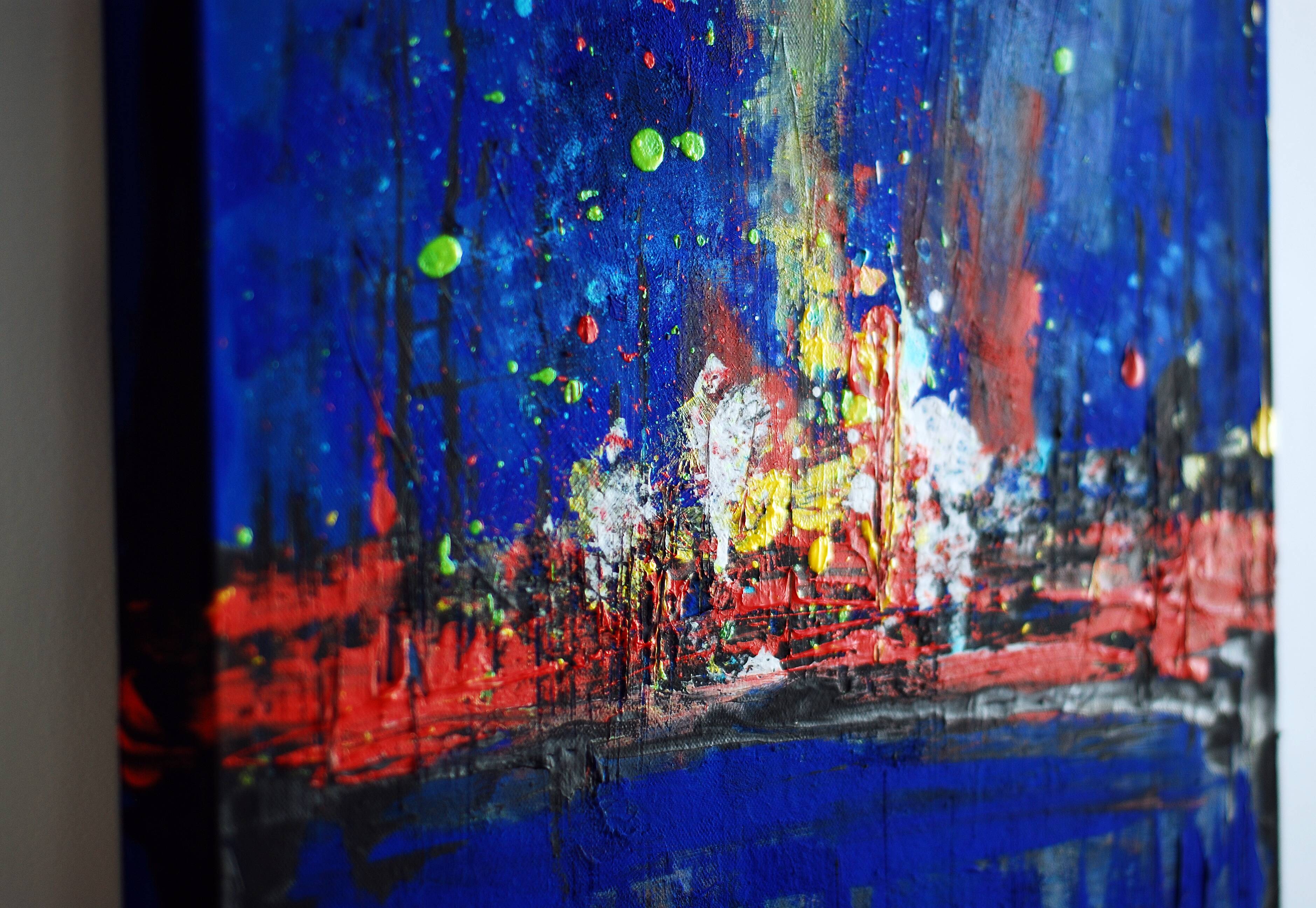 Abstract blue and red colors acrylic painting on stretched canvas