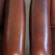 Set of 2 sheepskin club armchairs in a dark cognac colour