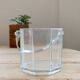 Vintage glass ice bucket with chrome handle.