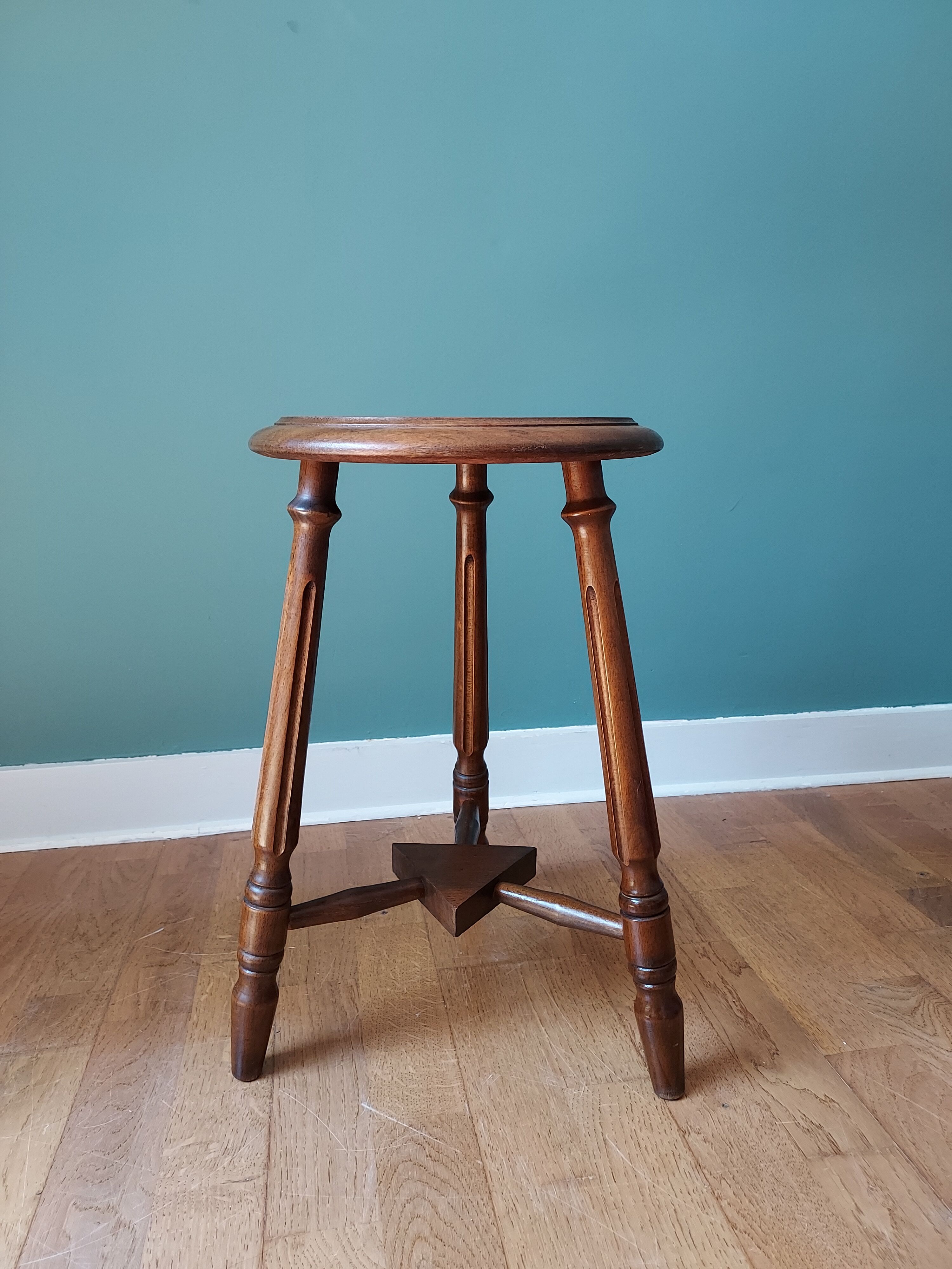 Carved tripod stool