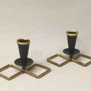 Pair of vintage candle holders in black metal and brass Sweden 1960