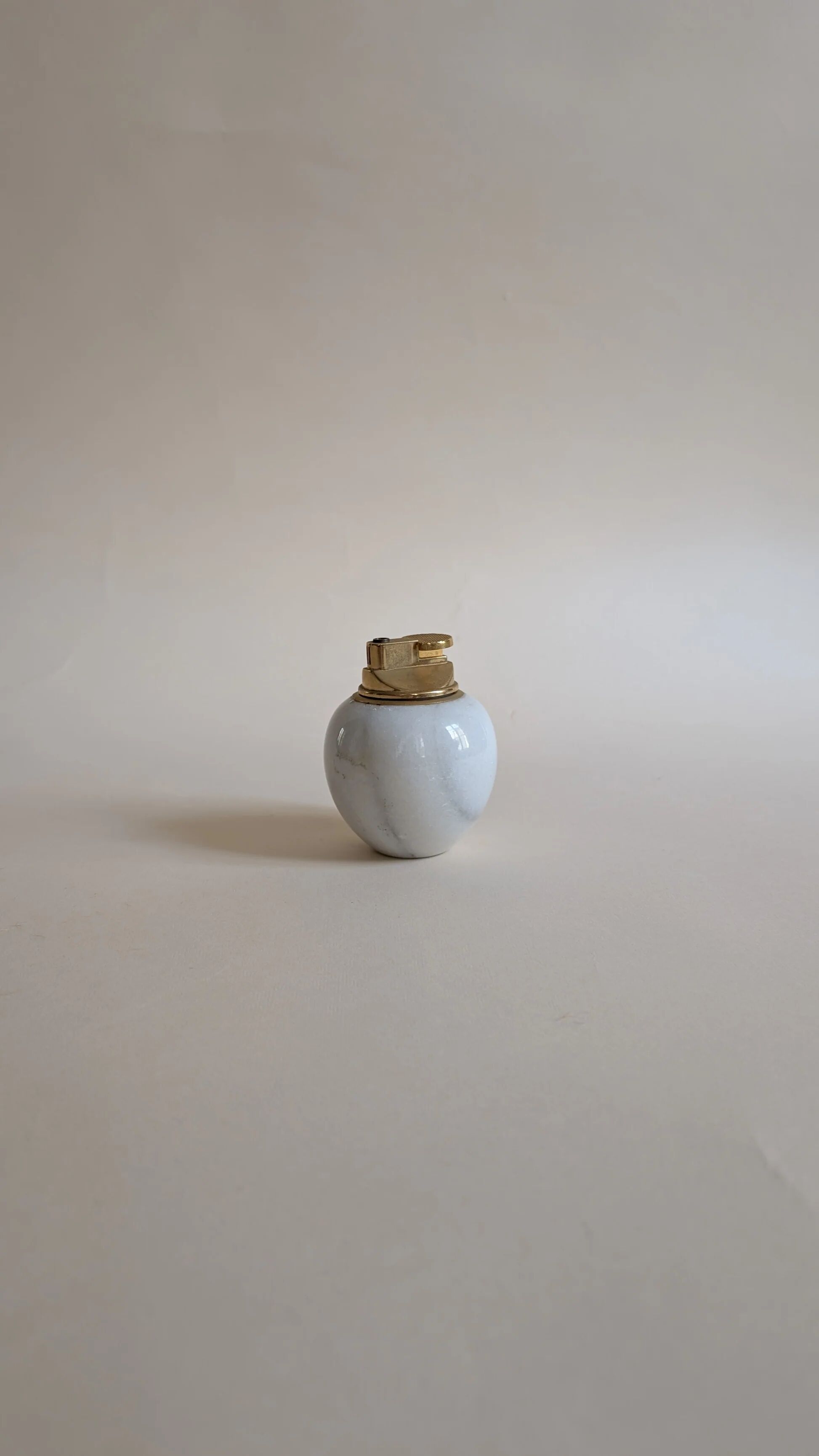 Table lighter in stone