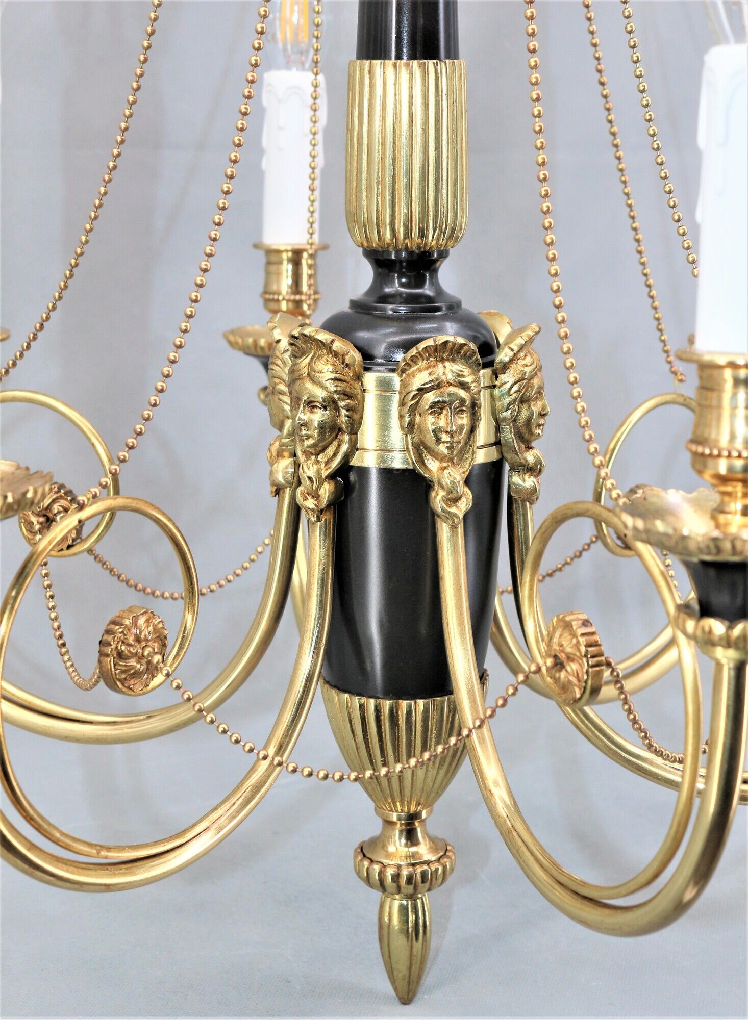 Chandelier style Directoire gilded and patinated in bronze " Lucien Gau "