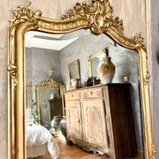 Antique gilded Louis XV pediment mirror