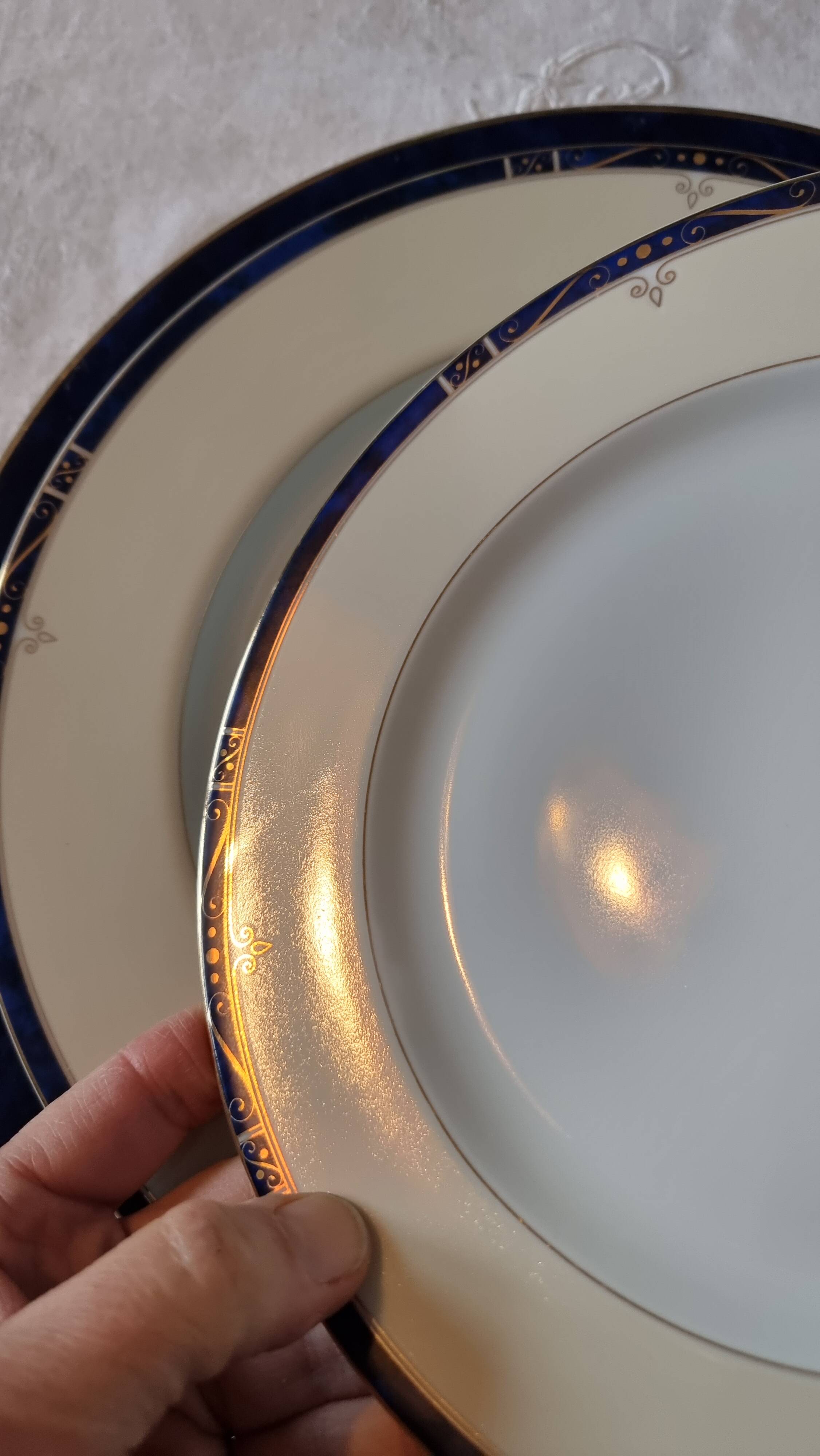 18-piece porcelain dinnerware set from Limoges by Philippe Deshoulières.