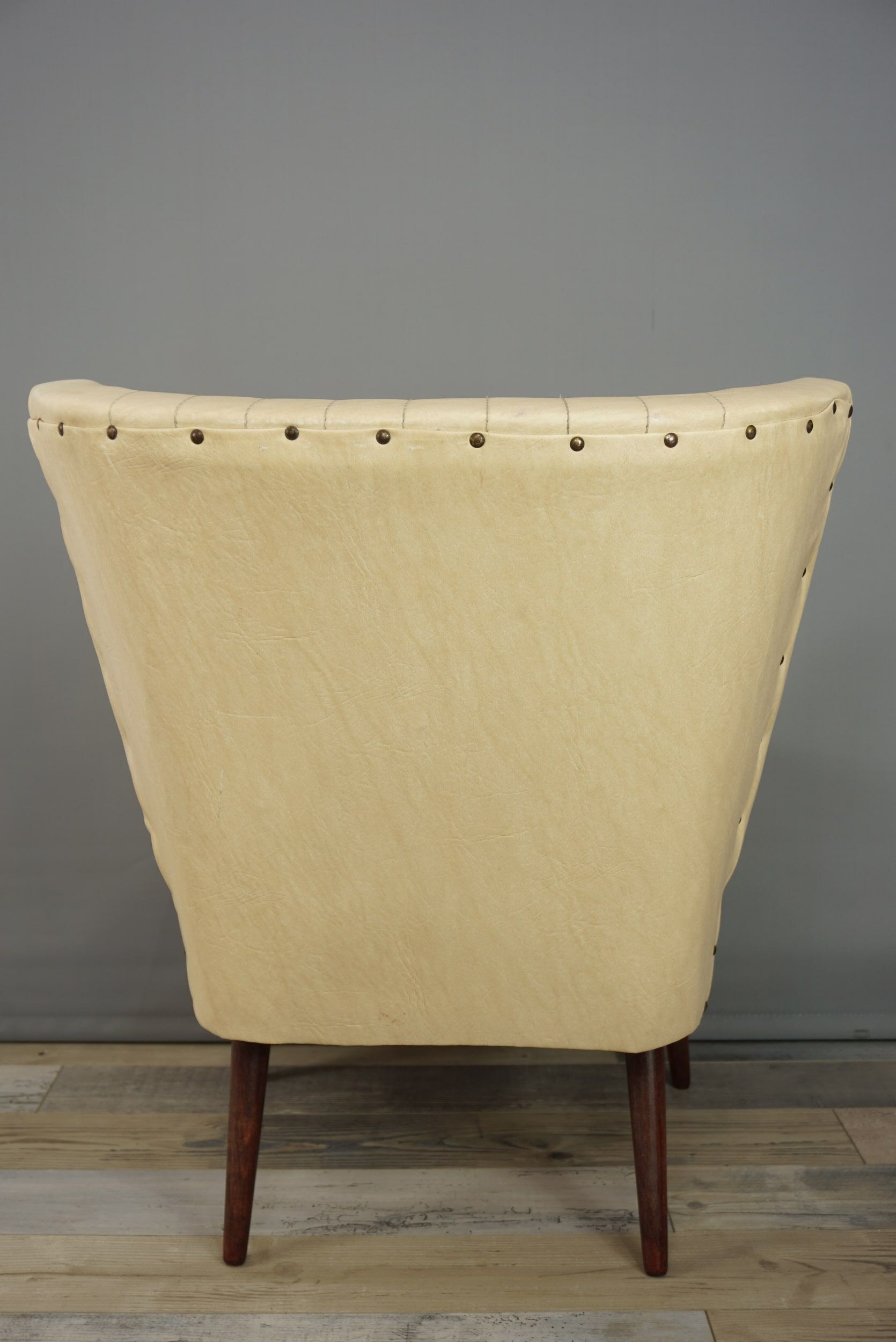Cocktail armchair 50s in wood and imitation leather