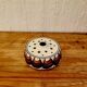 Vintage Jersey Pottery pique flowers in ceramic with a brown pattern from the 1970s.