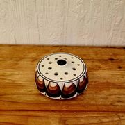 Vintage Jersey Pottery pique flowers in ceramic with a brown pattern from the 1970s.