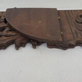 Carved wooden corner shelf
