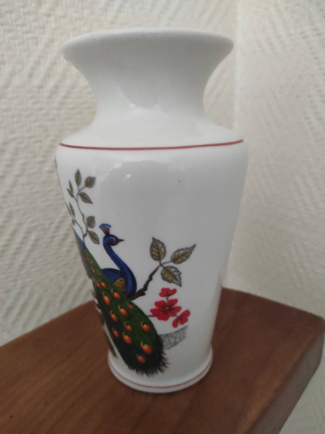 Porcelain vase with peacock decoration