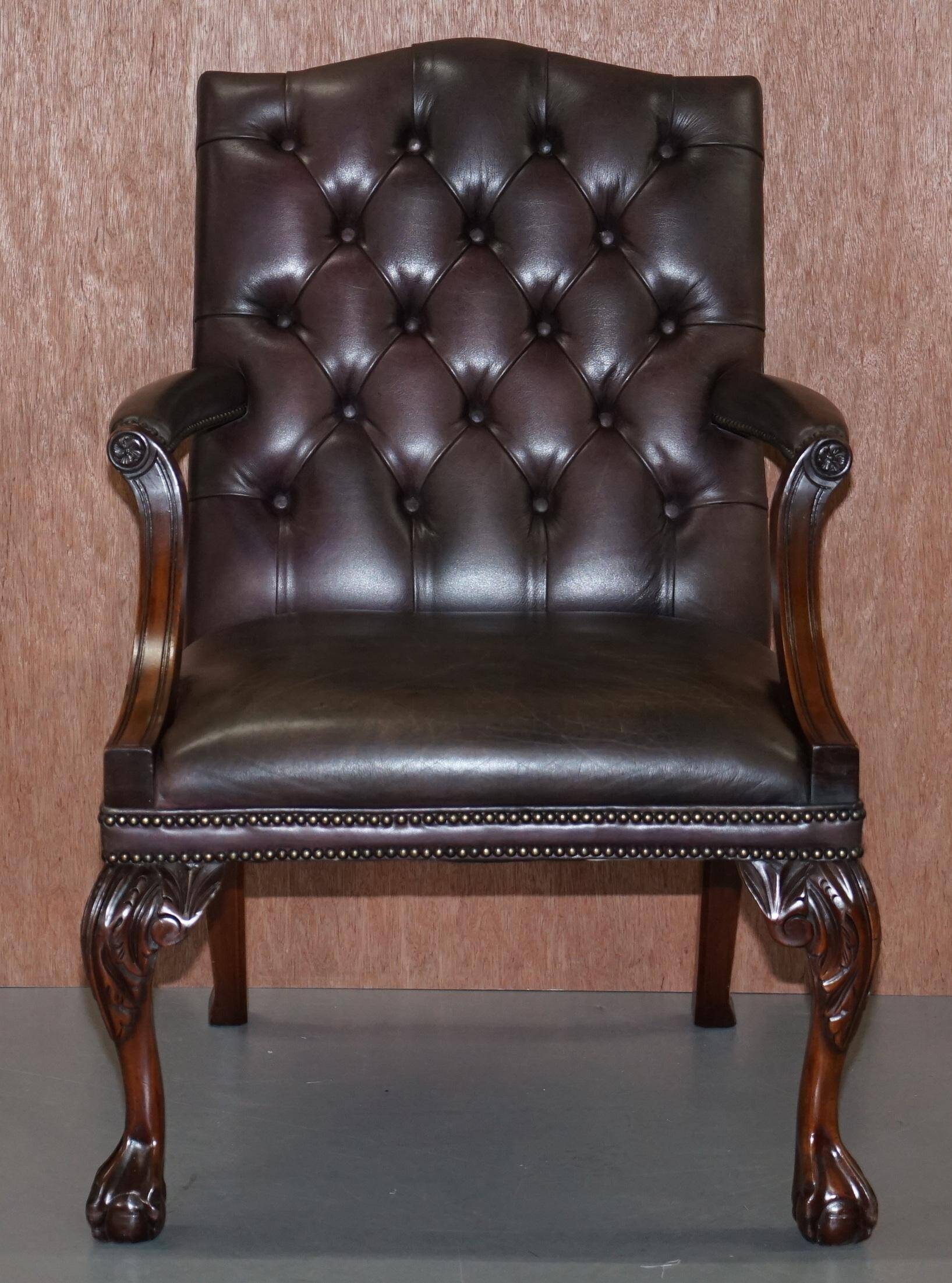Gainsborough armchair George II leather Chesterfield hand-carved with claw and ball feet.