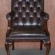 Gainsborough armchair George II leather Chesterfield hand-carved with claw and ball feet.