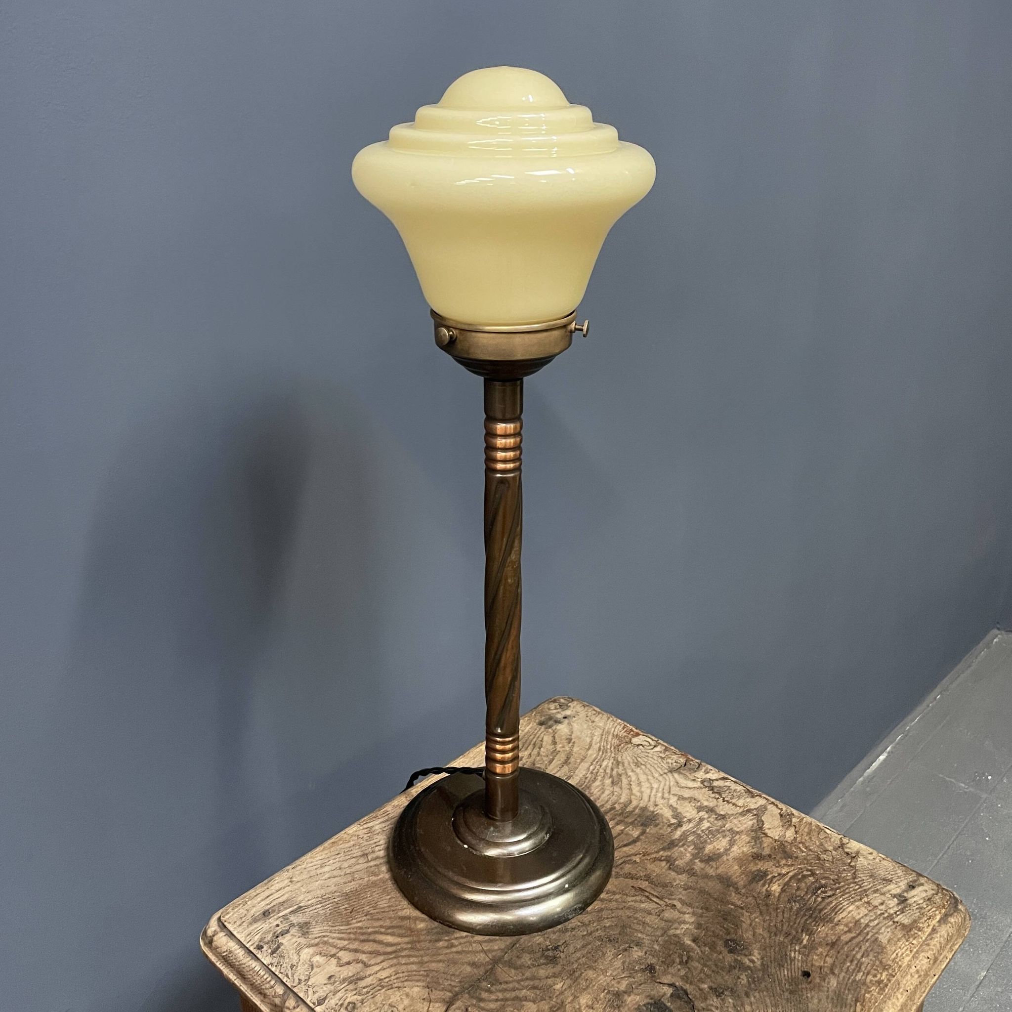 Standing copper table lamp with glass shade