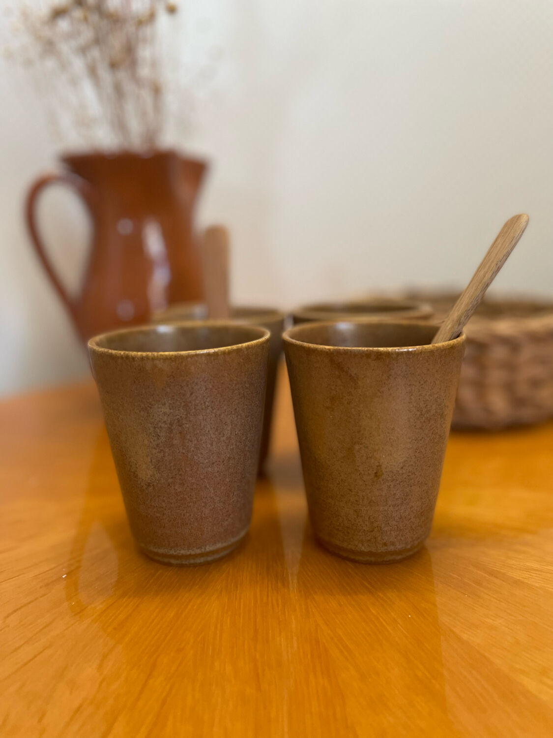 Set of 4 Digoin stoneware cups, glasses and wooden spoons