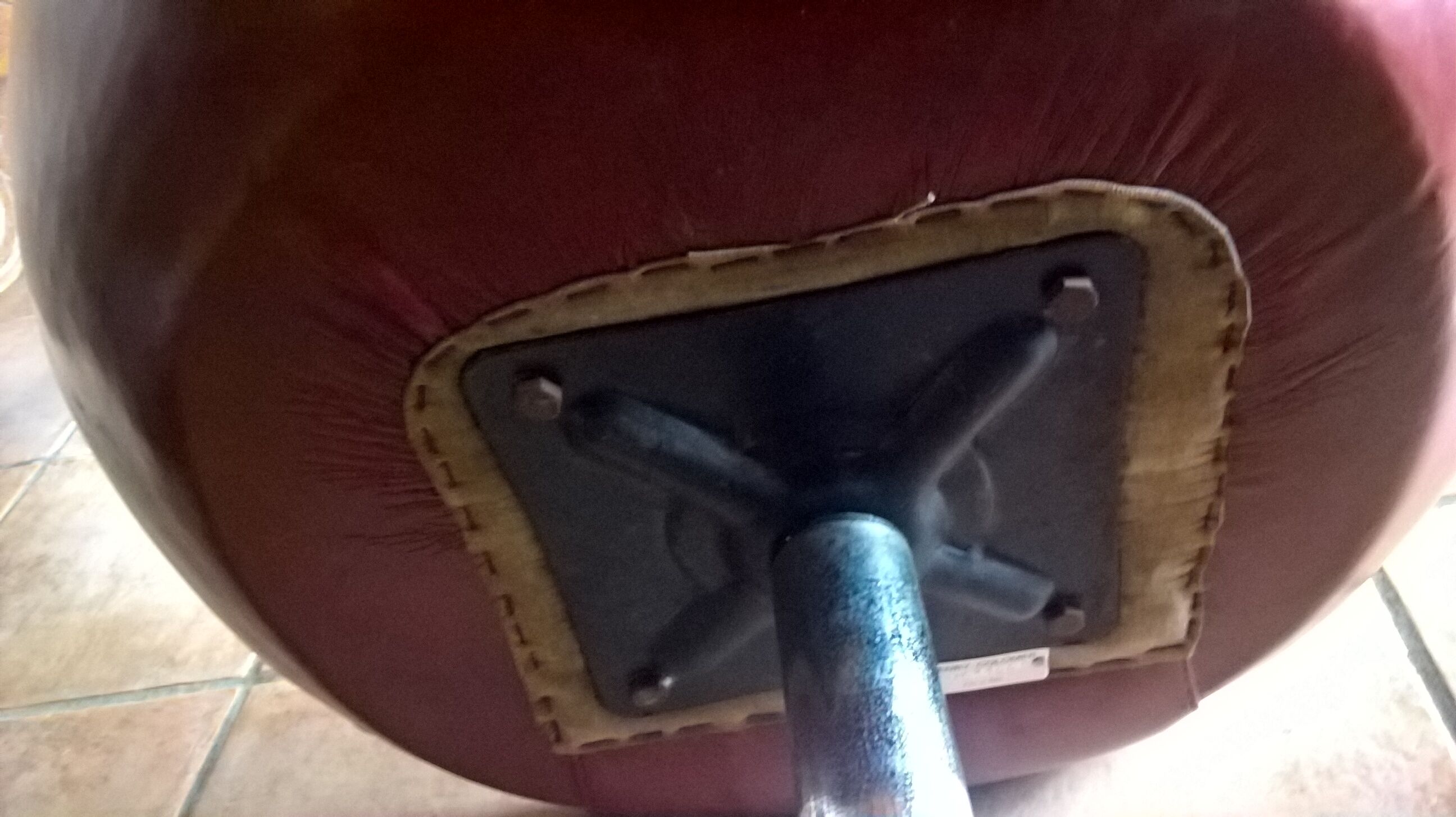 Swivel armchair stamped Henry Colomer