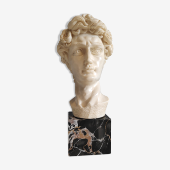 white composite bust and marble base