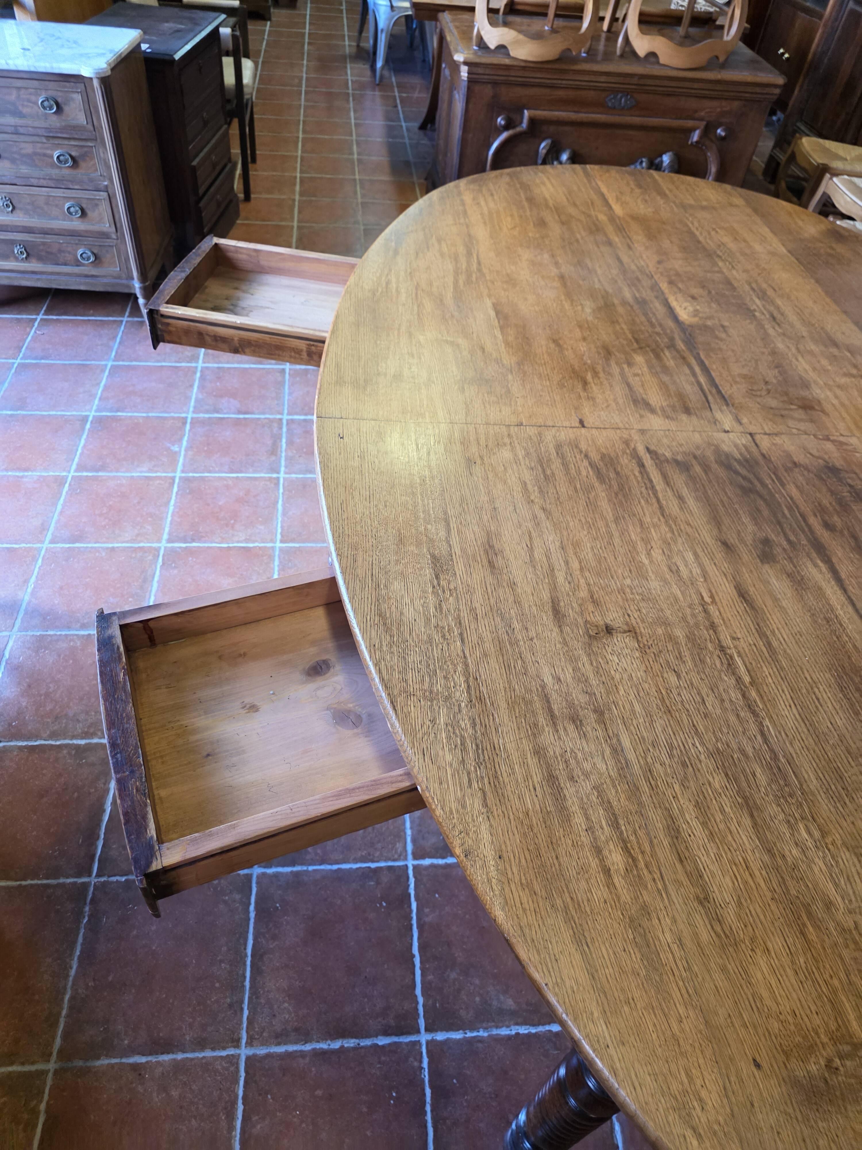 Large oval farmhouse table in solid oak, 19th century, 243 × 153cm