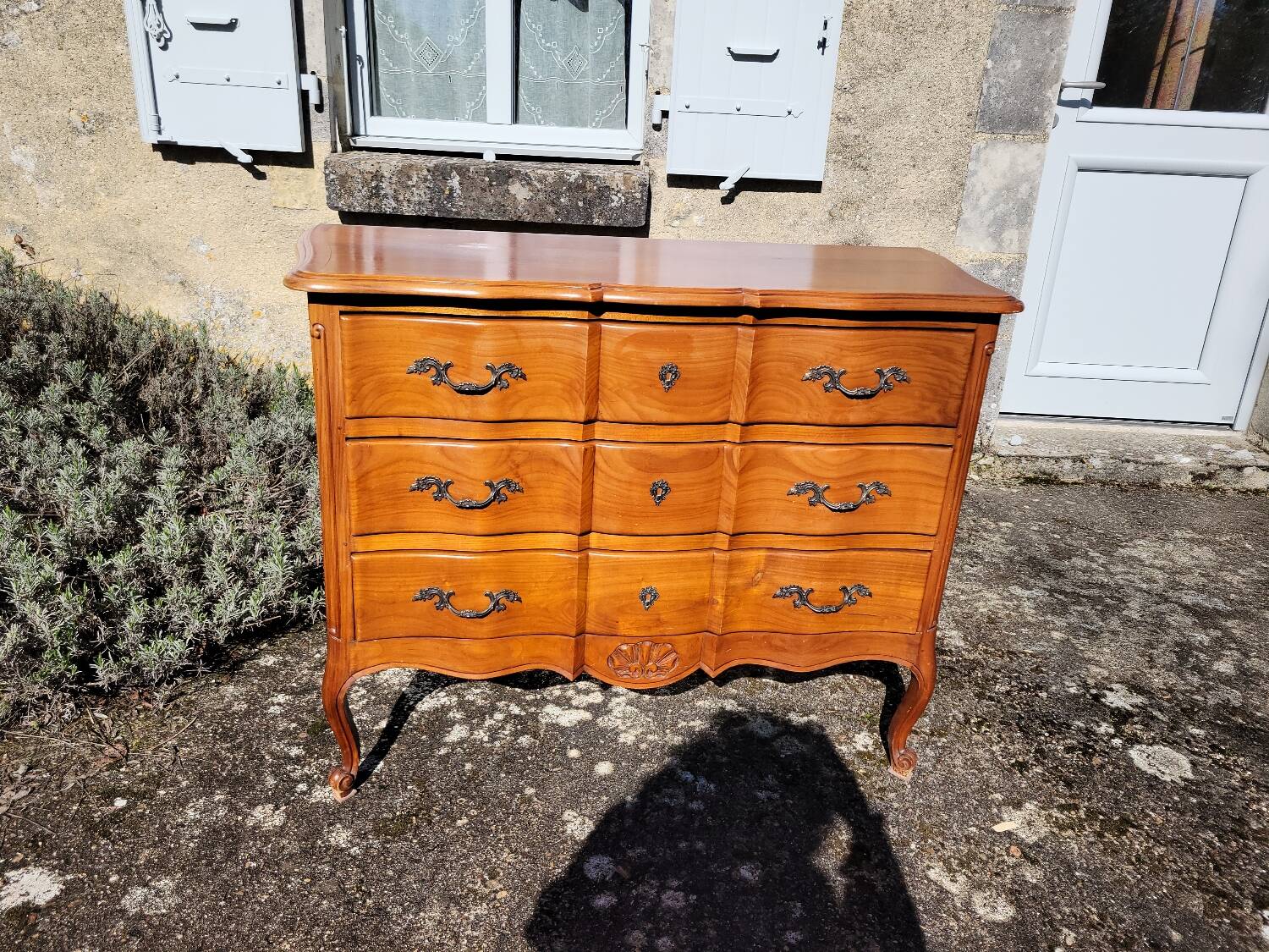 Louis XV style crossbow commode in cherry wood