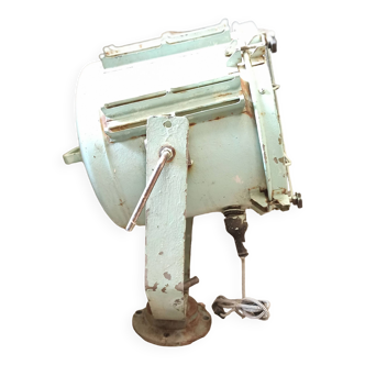 Old boat searchlight with pale green patina