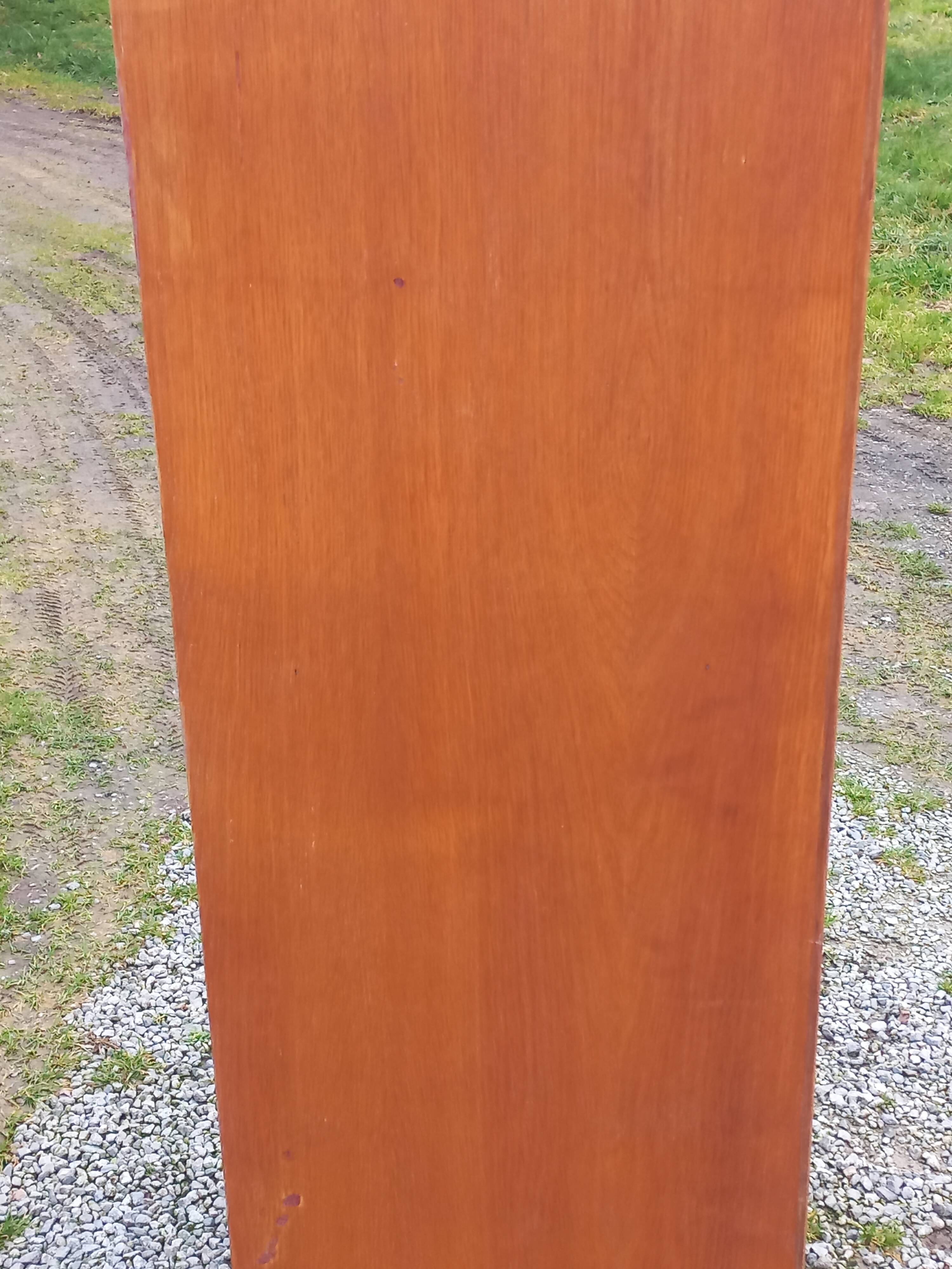 Vintage oak wardrobe with metal legs from the 1950s.