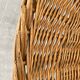 Pair of rattan and black metal armchairs, 1950s/60s