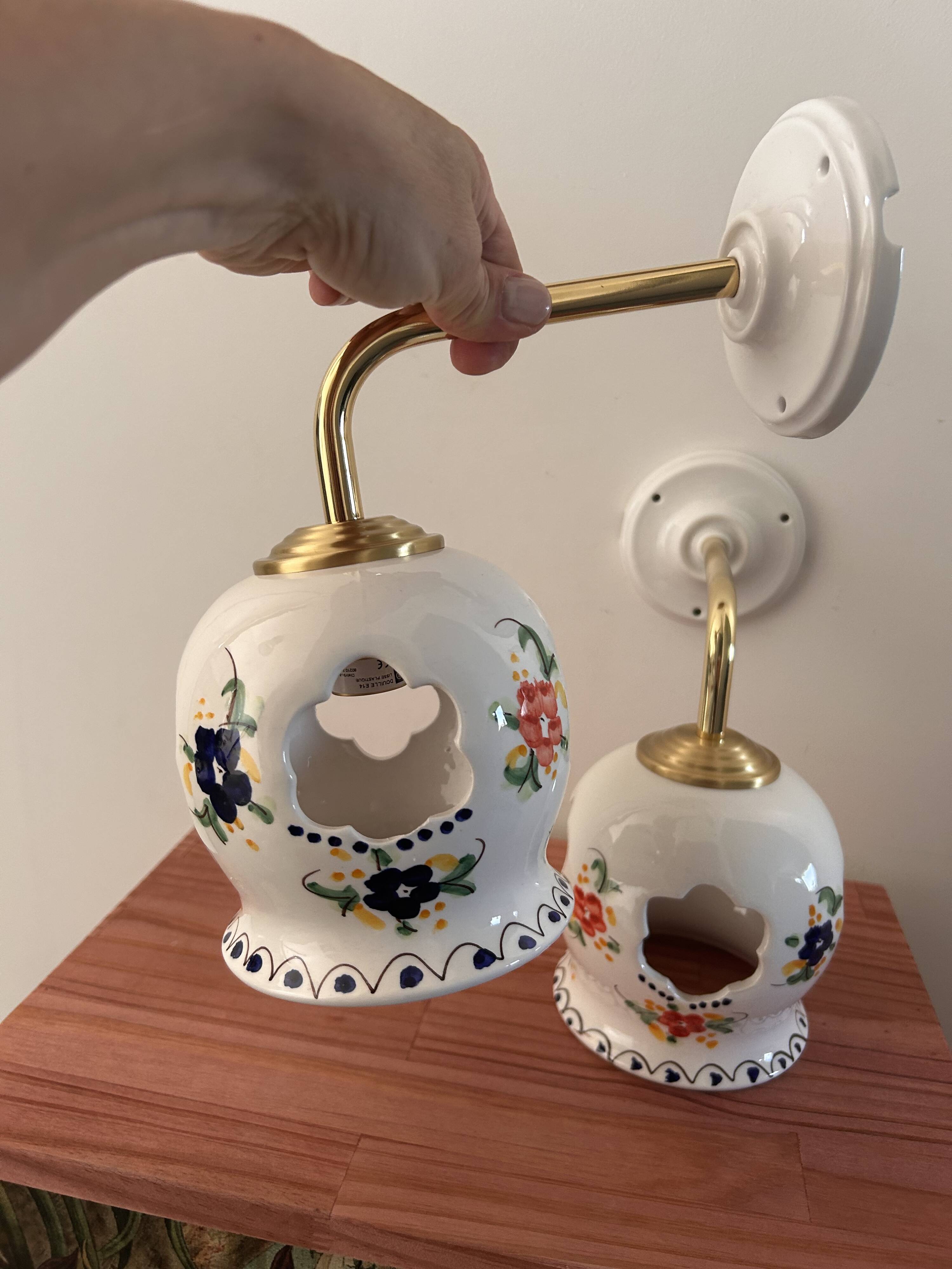 Pair of openwork ceramic wall lights