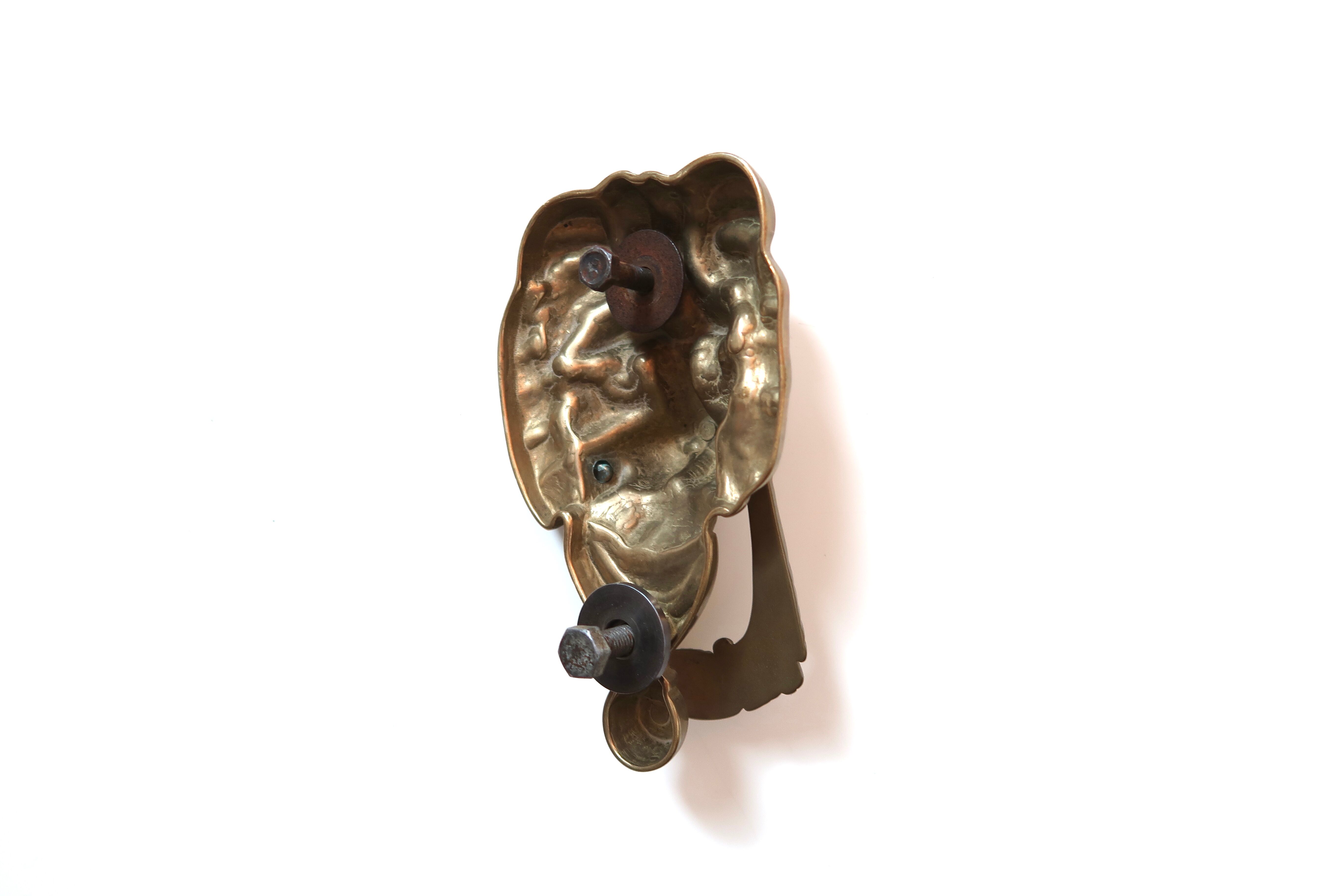Lion-shaped brass door knocker, 70s