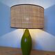 Vintage green glazed ceramic lamp and cane shade