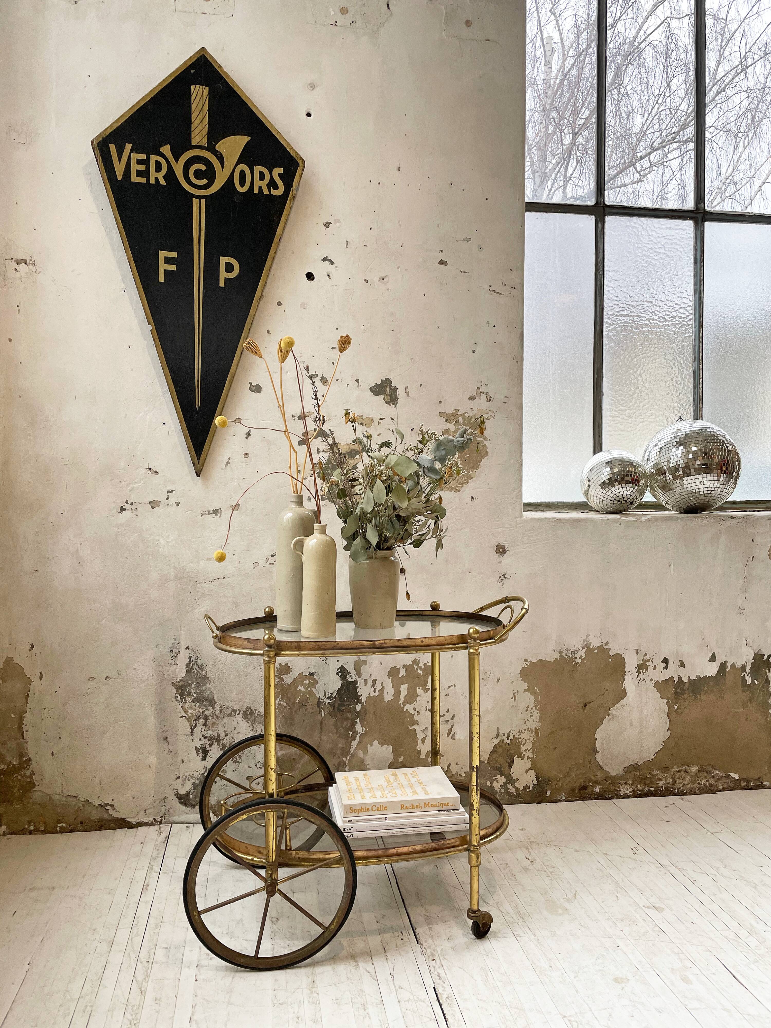 Cart serves brass bar