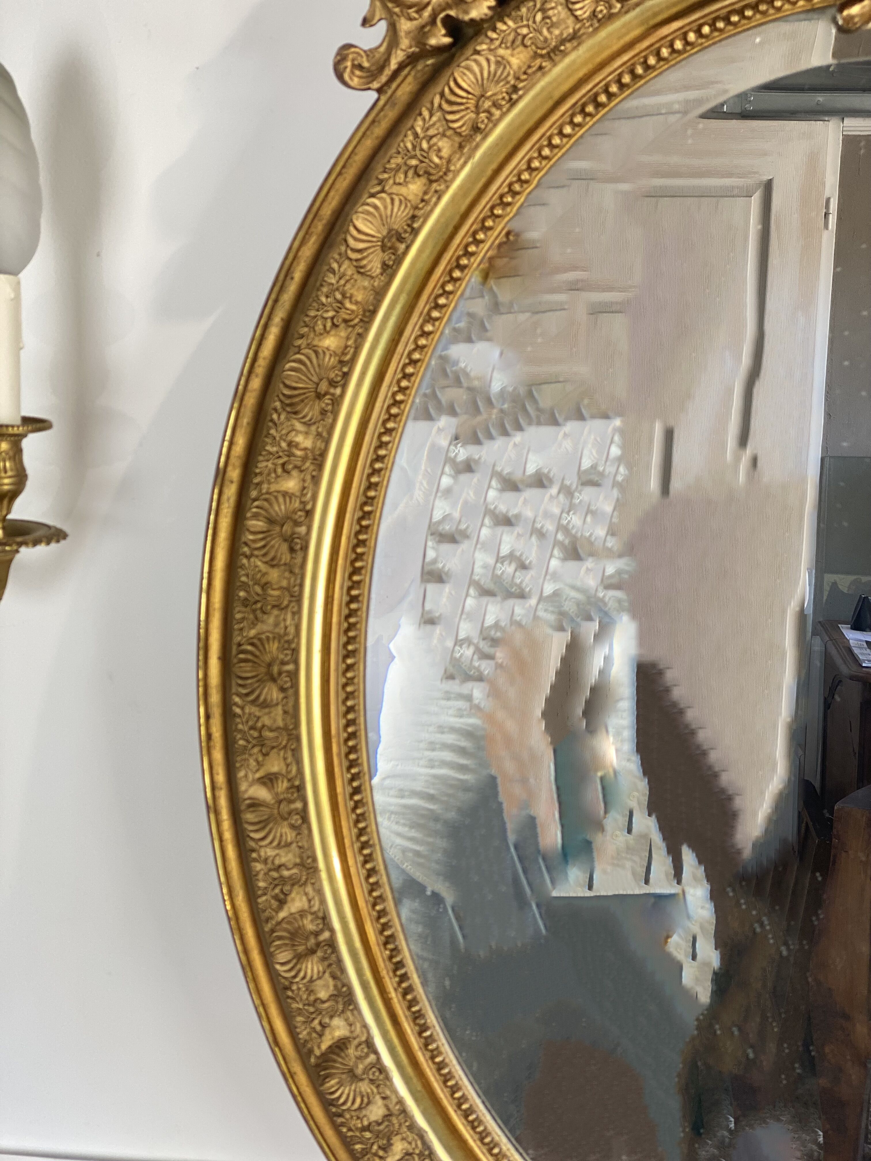 Mirror / oval ice Napoleon III period in wood and gilded stucco louis xv style