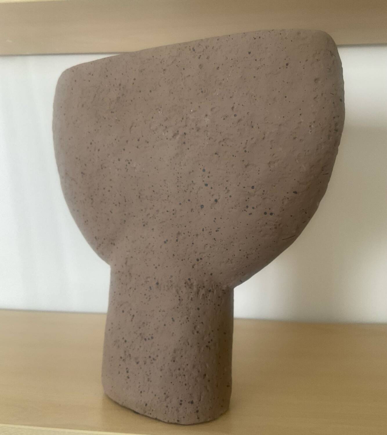 Vintage vase made of raw clay