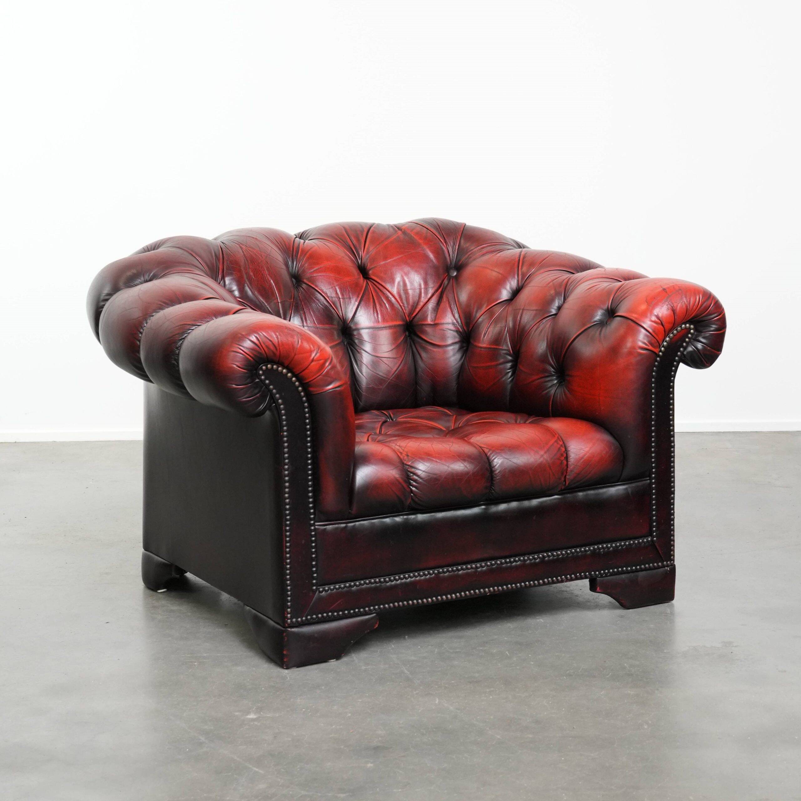 Classic cowhide Chesterfield button seat armchair in a beautiful red colour