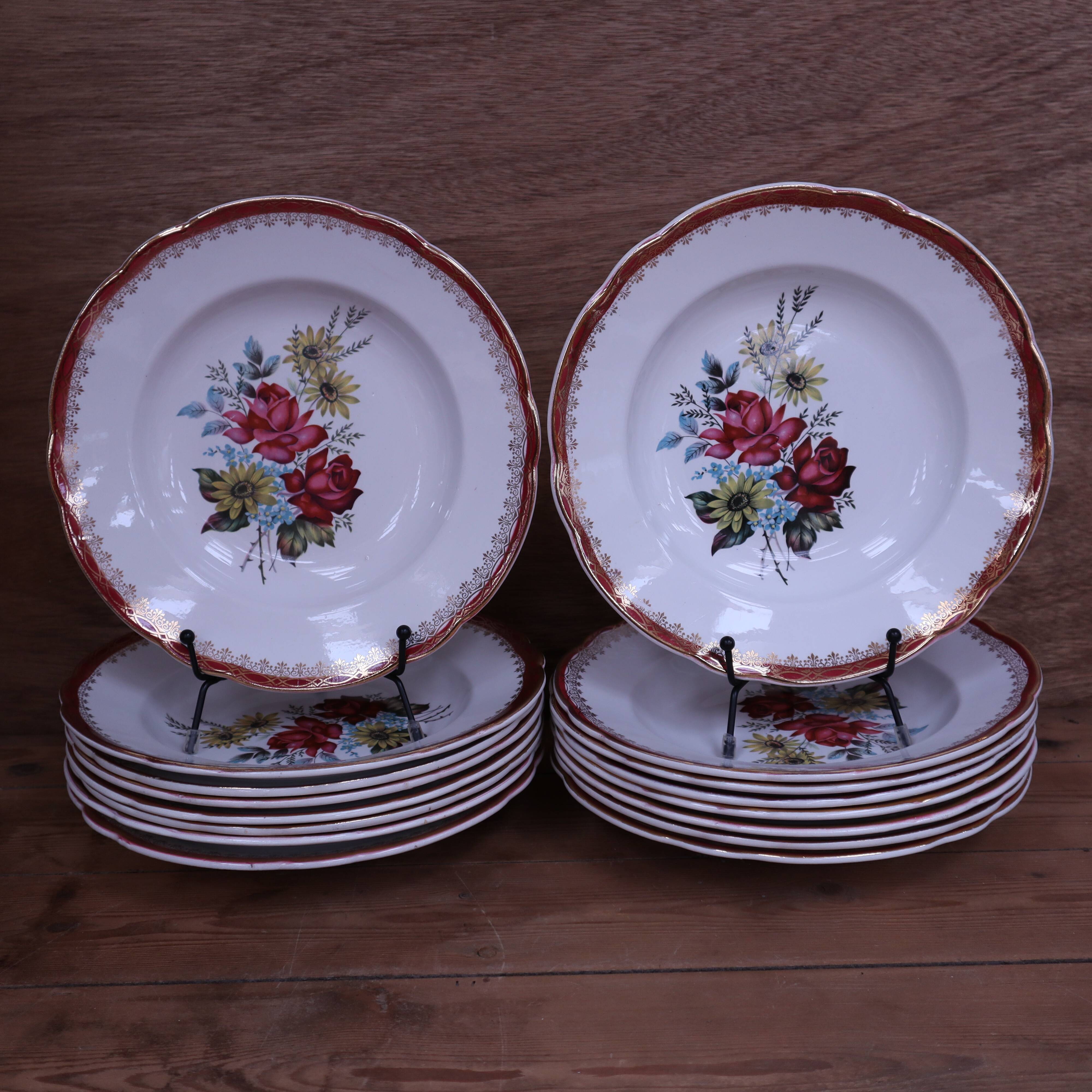 8 deep plates in half porcelain signed FB Floral decoration