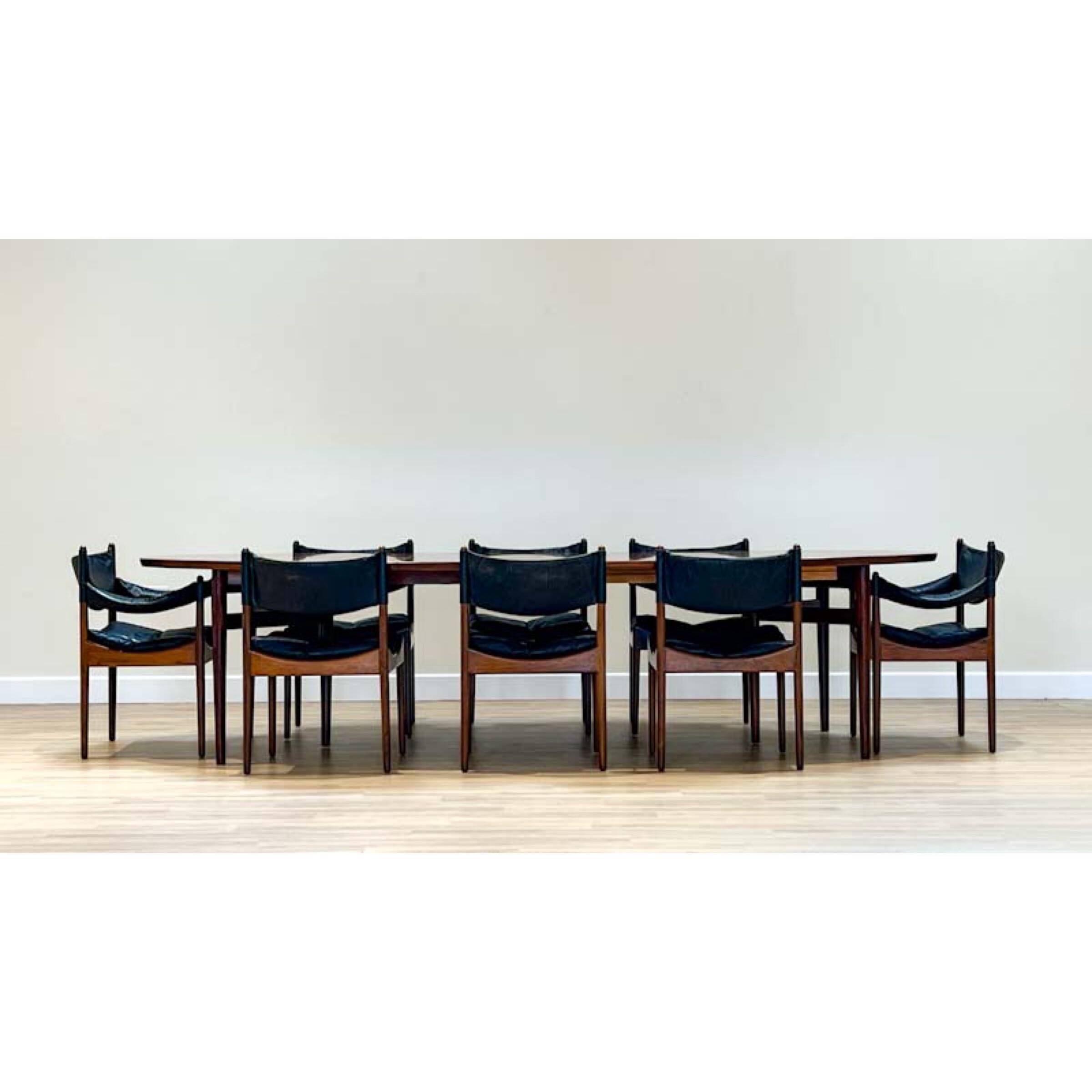 Extendable dining room table and chairs (by Kristian Solmer Vedel)