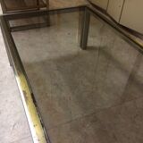 Coffee table with square tubular structure and smoked glass - 1970