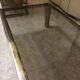 Coffee table with square tubular structure and smoked glass - 1970