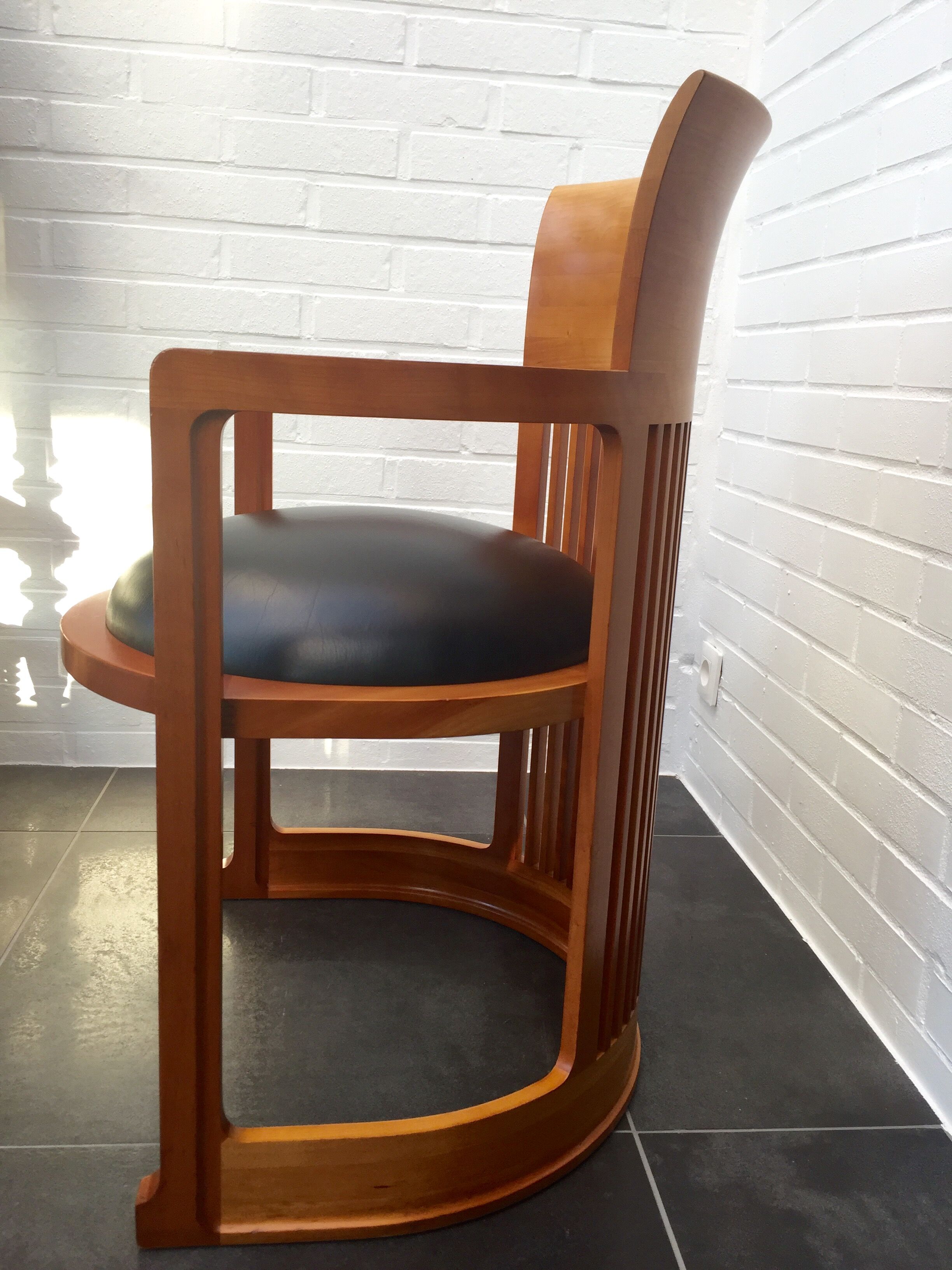 Pair of chairs 606 Barrel of Frank Lloyd Wright, edited by Cassina