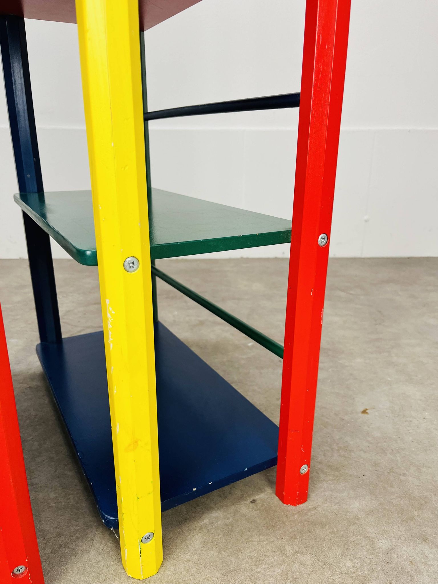 Pair of pencil-style shelves by Pierre Sala for children.