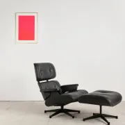 Lounge Chair and ottoman in black leather by Charles & Ray Eames, Vitra