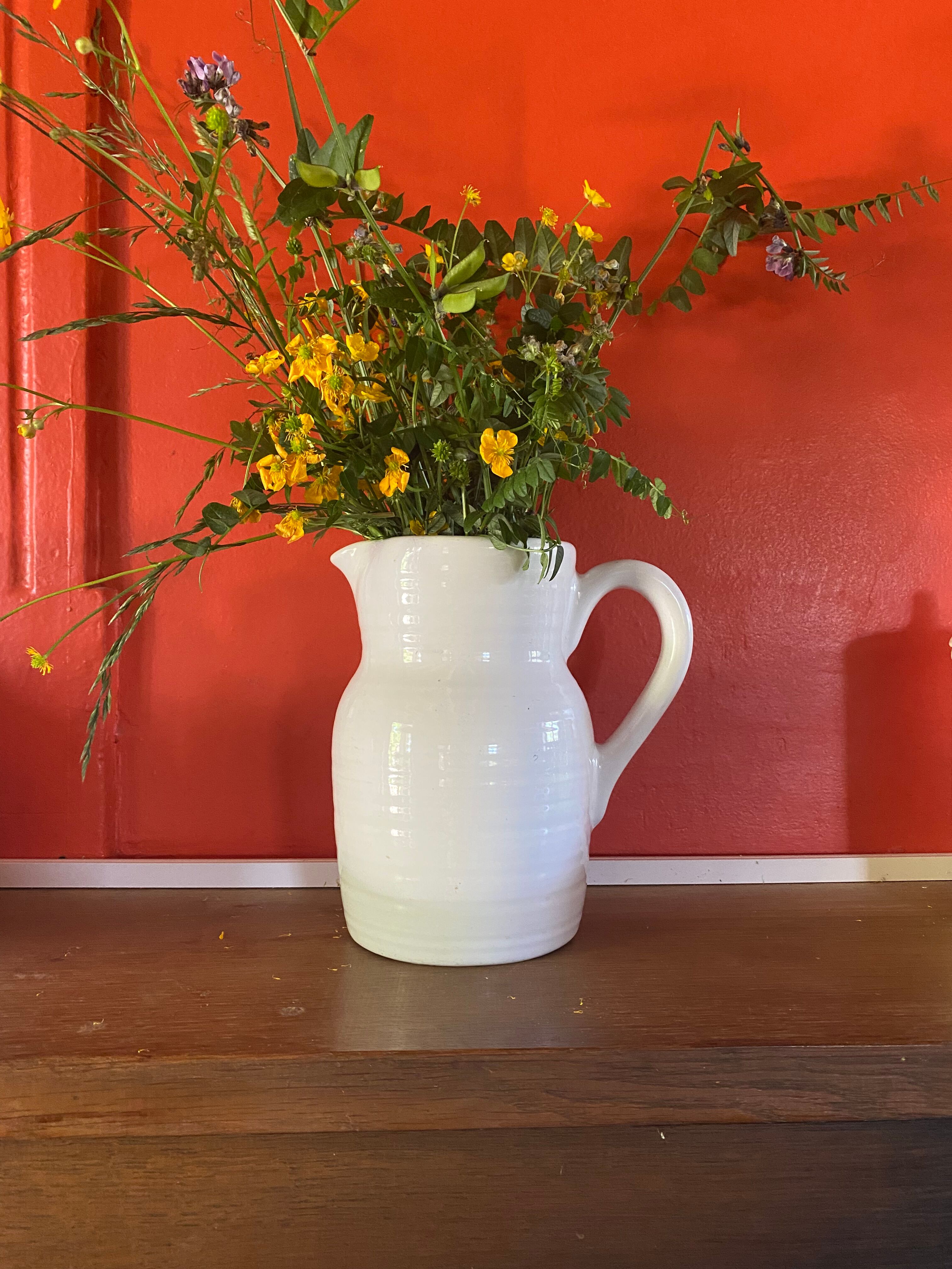 Large white ceramic pitcher