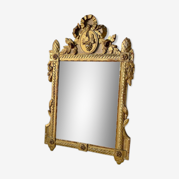 Miroir de style Louis XVI en bois doré