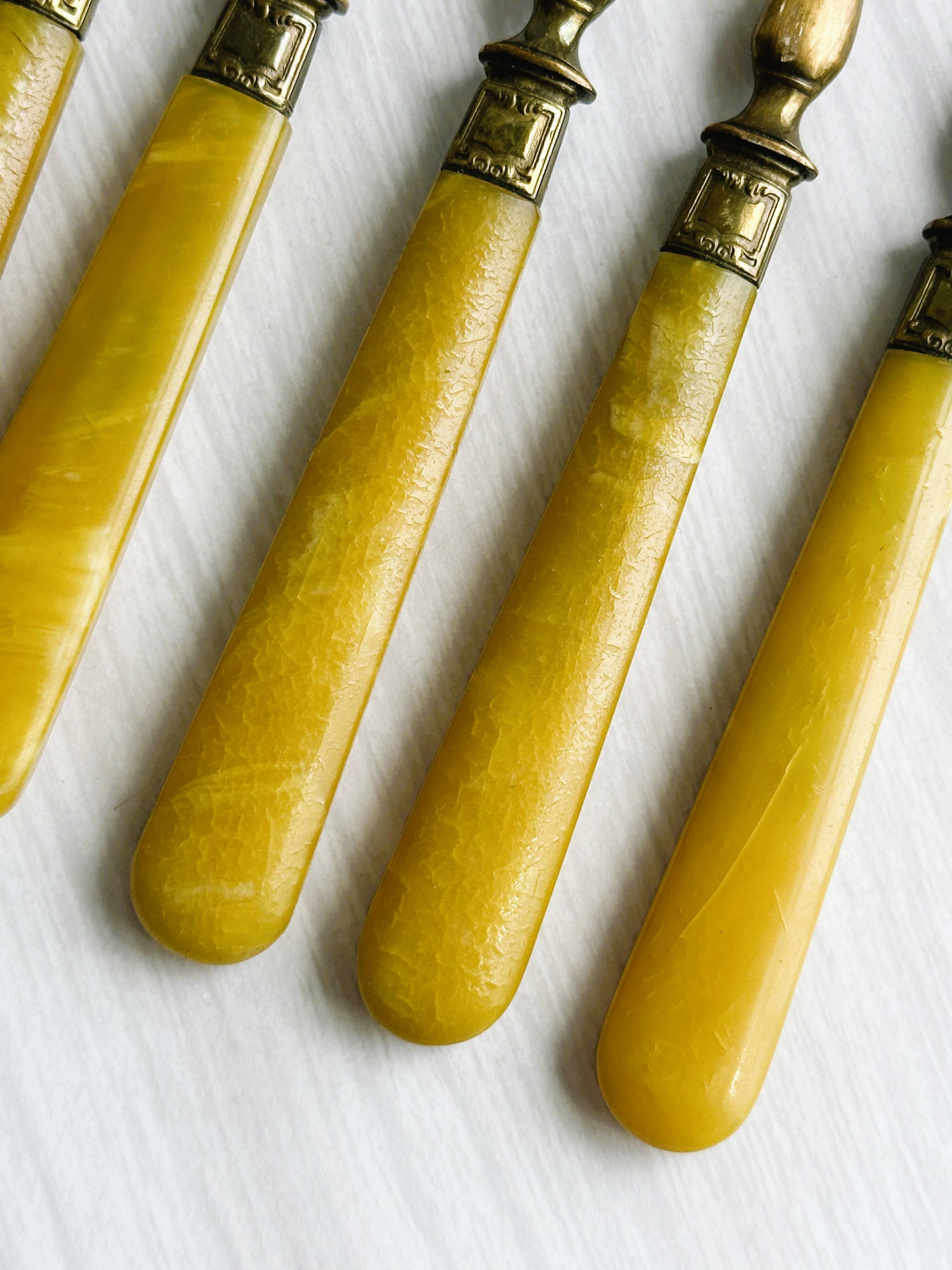 Set of 8 vintage gold metal dessert forks