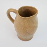 Small brown stoneware pitcher