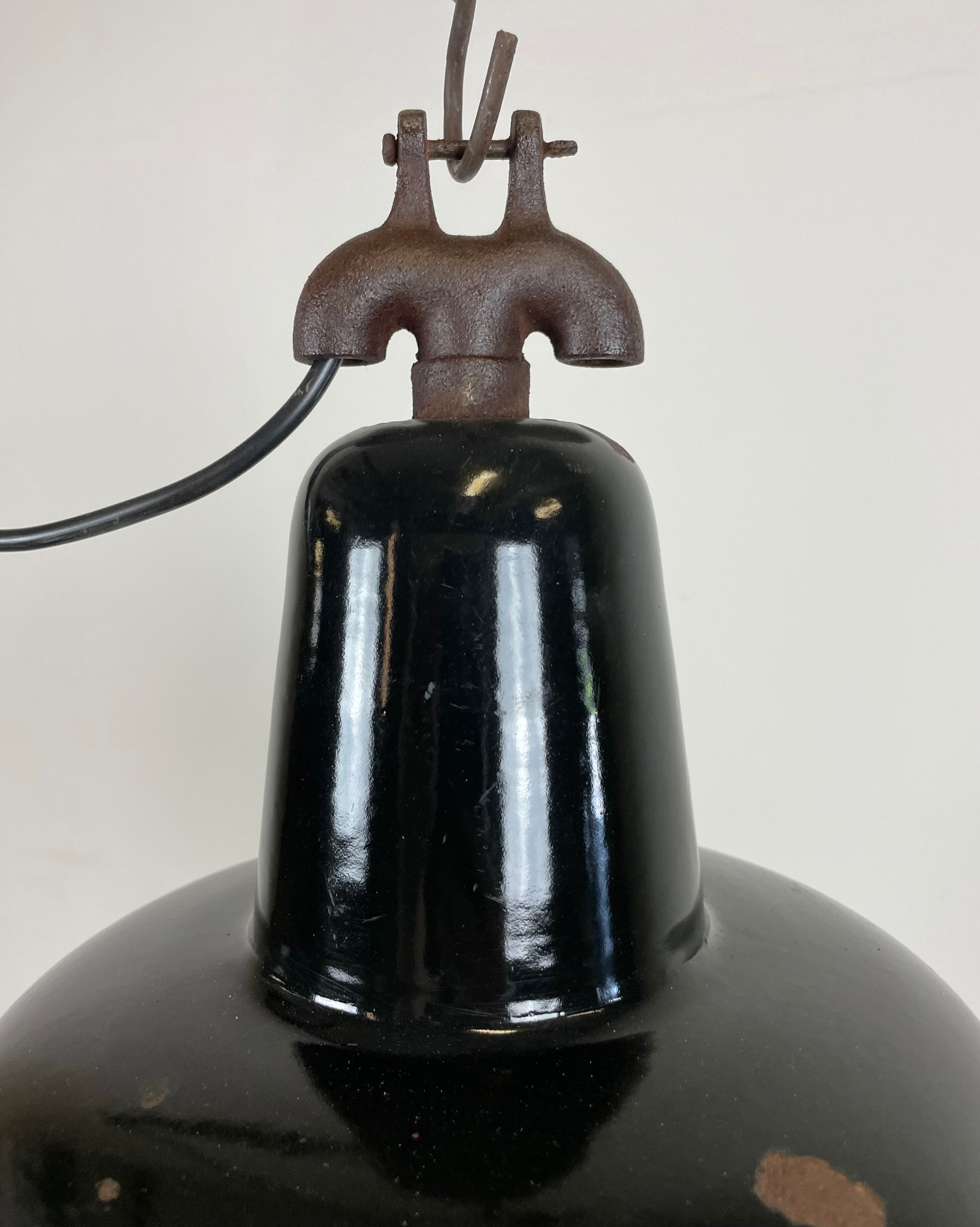 Industrial black enamel factory lamp with cast iron top, 1950s