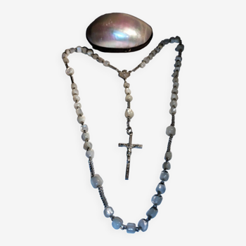 Old mother-of-pearl rosary in its egg box