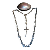 Old mother-of-pearl rosary in its egg box