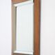 Art deco beveled mirror in an oak frame, 1940s.
