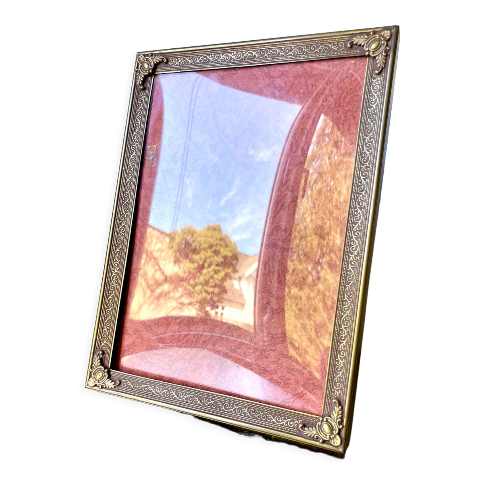 Metal frame in gold colored brass