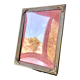 Metal frame in gold colored brass