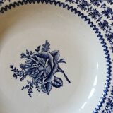 Six soup plates don't match in red and blue.